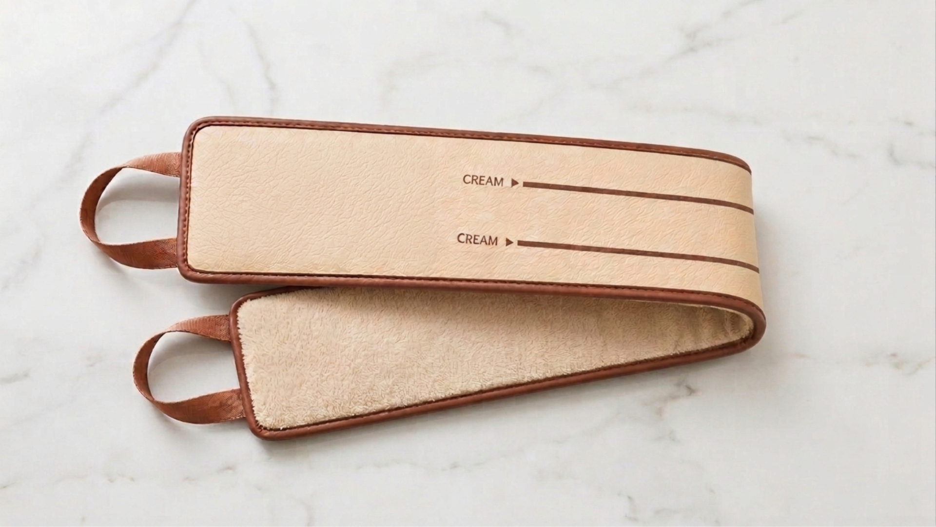 DORSA applicator — both sides shown on marble